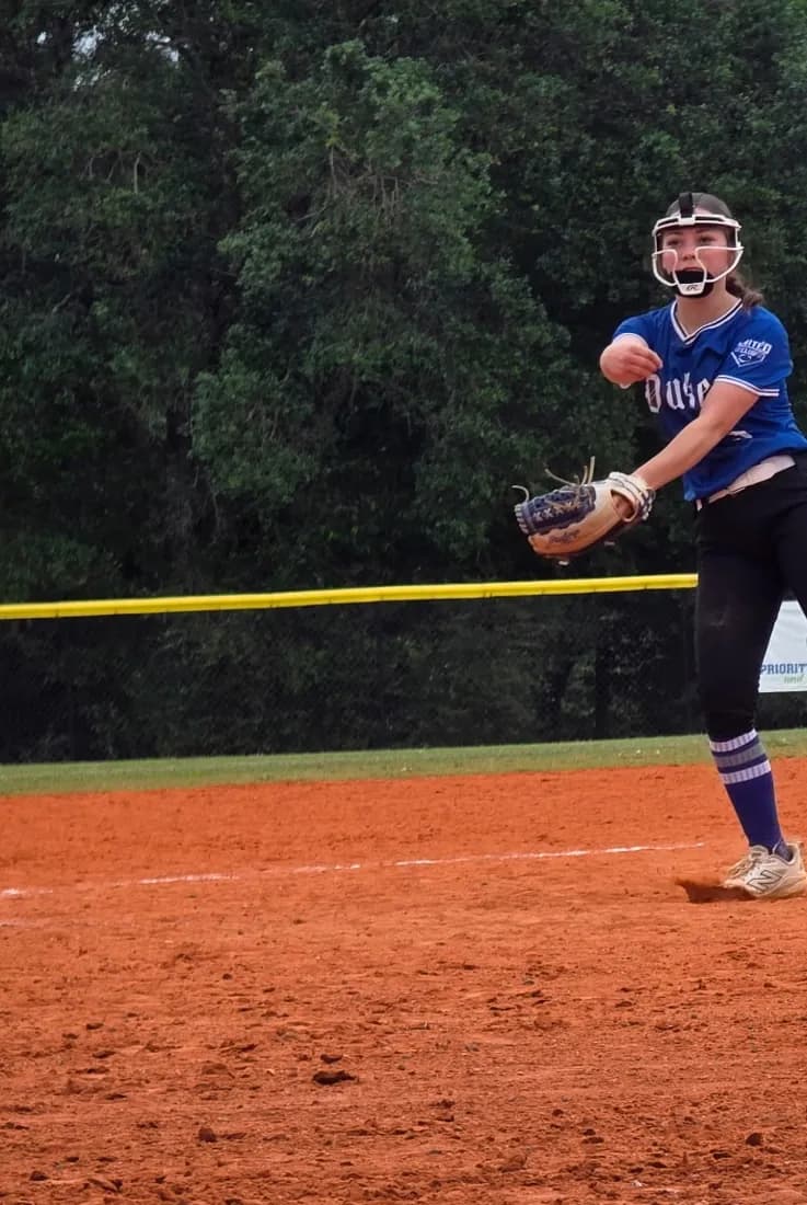 Alexis Arnold in her windup in the circle for the Lady Dukes.
