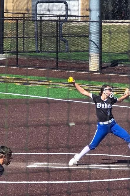 Alexis Arnold pitching at the Miss Gulf Coast College play date.